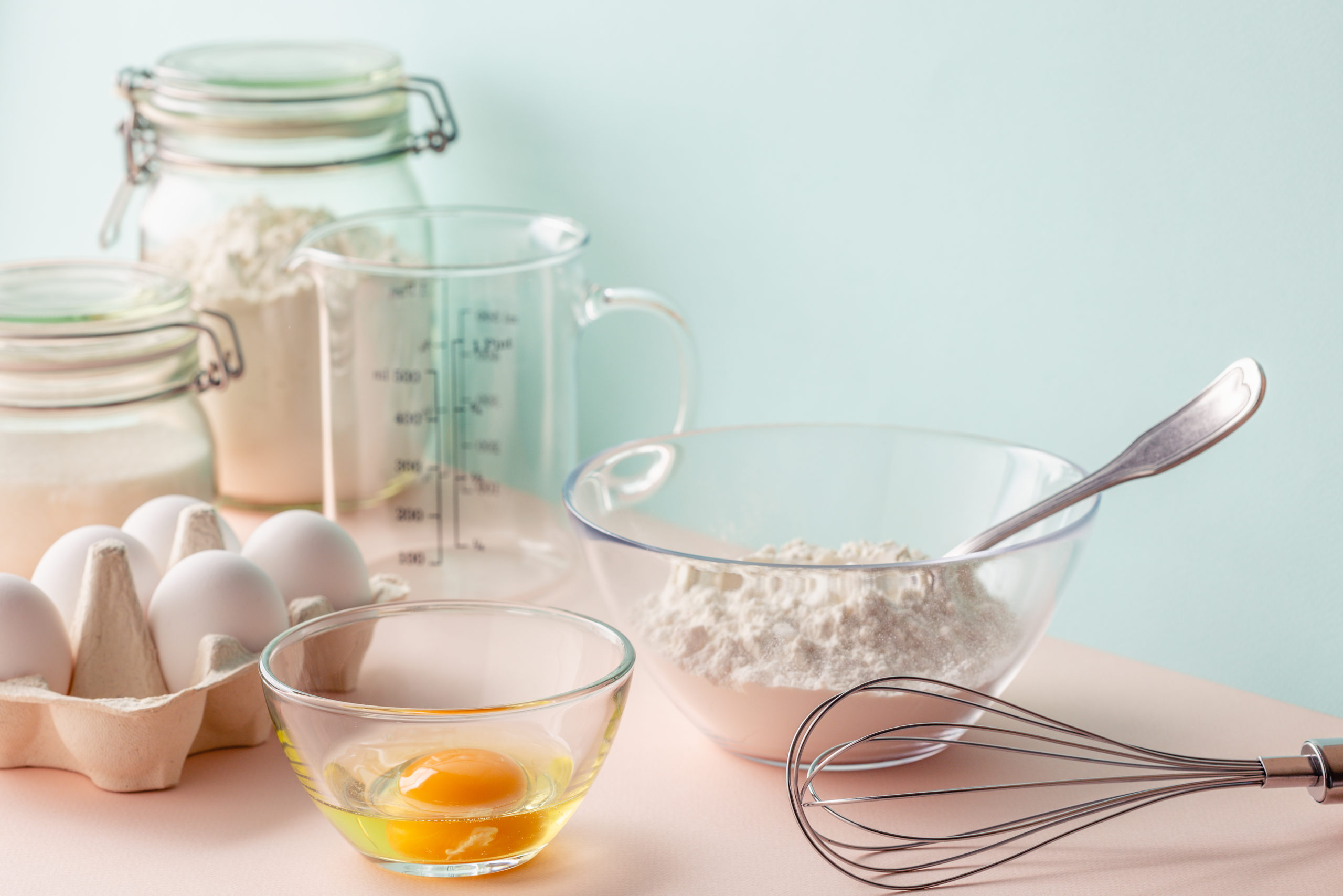 Cooking ingredients for dough, eggs, flour, sugar. Baking background. Cooking ingredients for dough, eggs, flour, sugar.